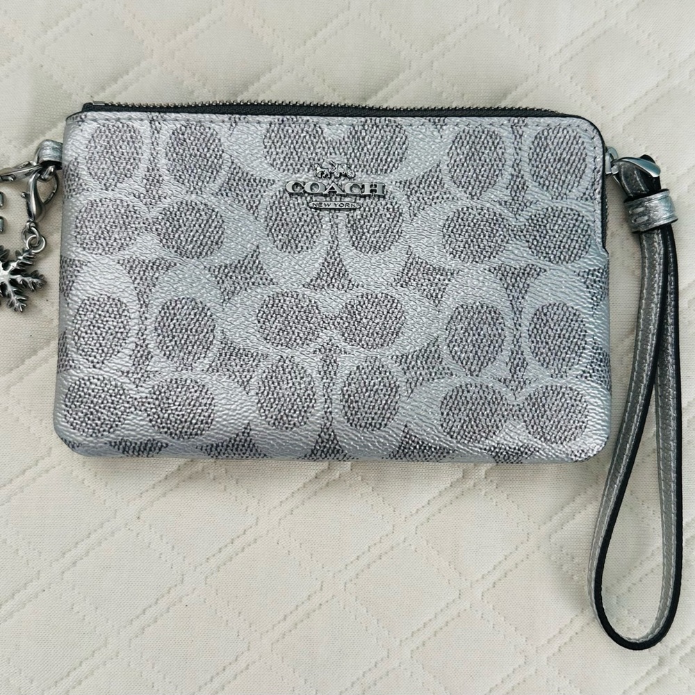 Coach silver metallic wristlet purse 
Never used
